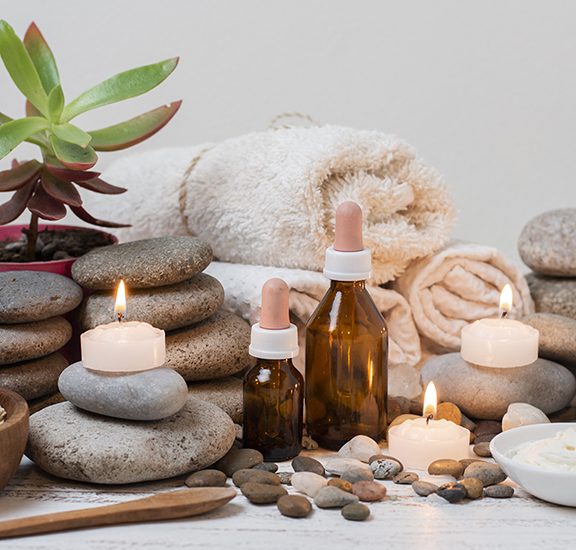 composition-with-spa-stones-lit-candles